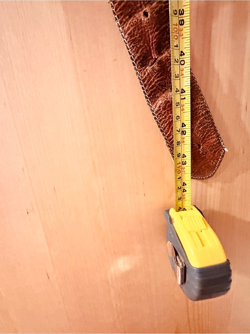 Brown leather belt/gold ring